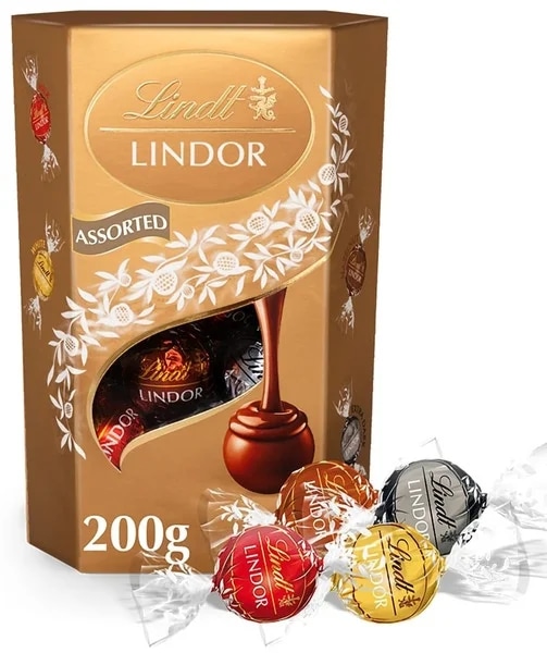 Lindt Lindor Směs mléčné. bílé a hořké čokolády s jemnou krémovou náplní