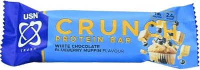USN Trust Crunch - bílá čokoláda/borůvkový muffin