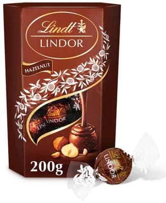Lindt Lindor Mléčná čokoláda s jemnou krémovou náplní s kousky ořechů