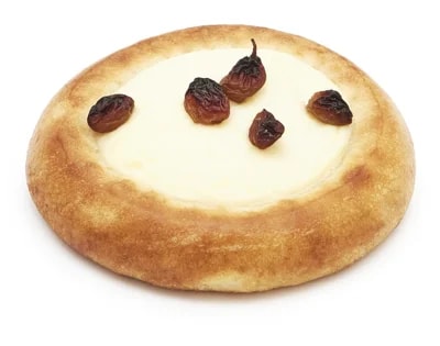 Český pekař Koláček s tvarohovou náplní